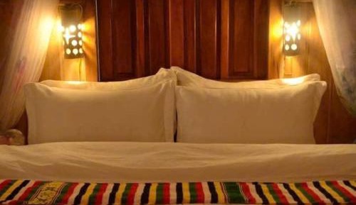 Single Bed in Dormitory Room