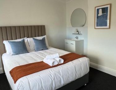 Queen Room with Shared Bathroom
