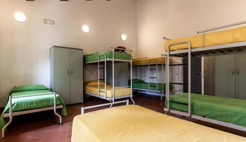 Single Bed in Dormitory Room