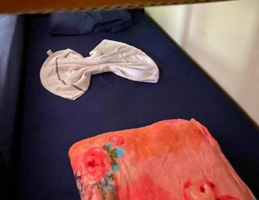 Single Bed in Dormitory Room
