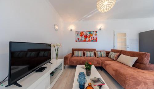 Three-Bedroom Apartment with Balcony and Partial Sea View