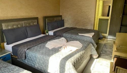 Quadruple Room with Private Bathroom