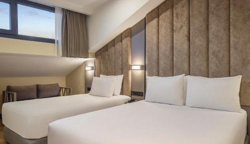 Premium Room with One Queen and One Single Bed