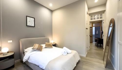 One-Bedroom Apartment with Balcony and City View