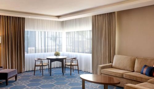 One Bedroom Suite with Two Queen Beds and Parlor with Sitting Area