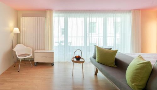Junior Suite with Balcony/Sitting Area or Family Room