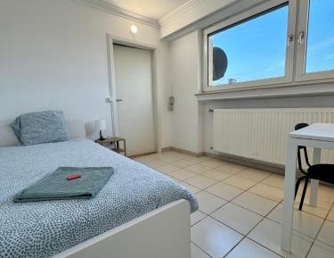 Single Room with Shared Shower and Toilet