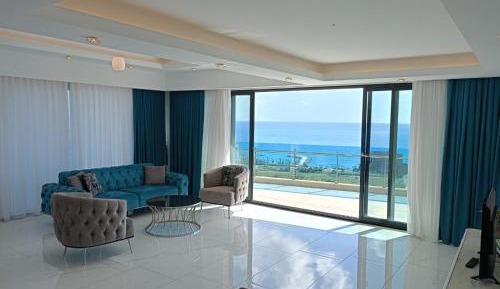 Three-Bedroom Apartment with Sea View