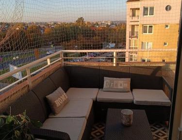 Three-Bedroom Apartment with Balcony