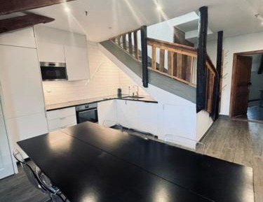 Four-Bedroom Apartment with Balcony 