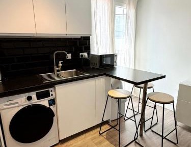 Two-Bedroom Apartment with Balcony