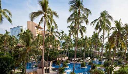 Junior Suite with Two Double Beds and Partial Ocean View