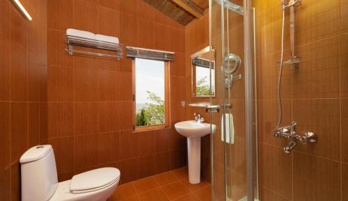 One-Bedroom Suite with  Free City Shuttle, Complimentary Steam, Sauna, Jacuzzi, Welcome Drink, 15% Spa Discount, Evening Tea with Cookies, VIP Kailashnath Mahadev Tour & Live Magic Show 