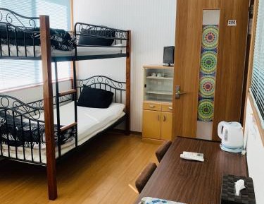 Quadruple Room with Shared Bathroom