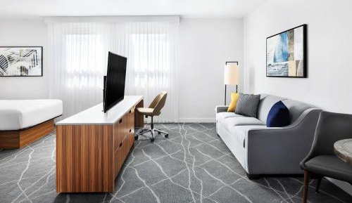 Deluxe Room with Two Queen Beds and Sofa Bed