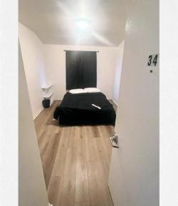 Queen Room with Shared Bathroom