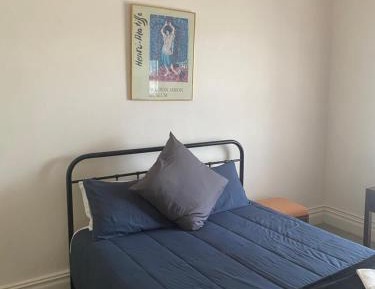 Queen Room with Shared Bathroom