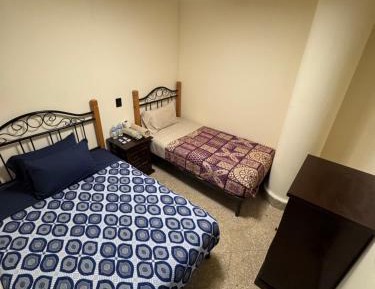 Triple Room with Shared Bathroom