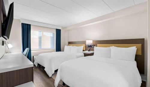 Two-Room Queen Suite with Two Queen Beds and Sofa Bed - Non-Smoking