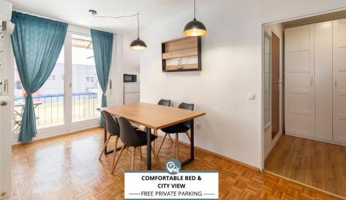 One-Bedroom Apartment with Balcony and City View