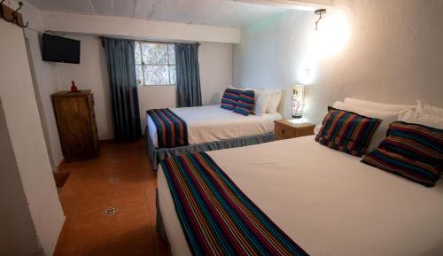 Quadruple Room with Private Bathroom