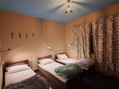 Economy Triple Room with Shared Bathroom