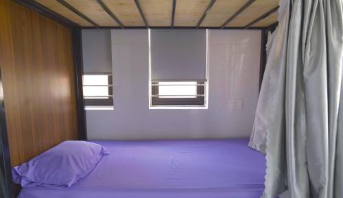 Single Bed in Dormitory Room