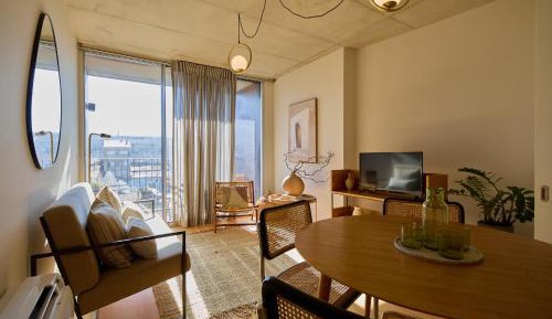 One-Bedroom Apartment with Balcony and Street View