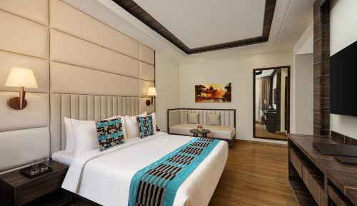 Premium Room with free city shuttle Welcome drinks Complimentary Steam, Sauna & Pool, VIP Kailashnath Mahadev Statue Tour & Live Magic Show