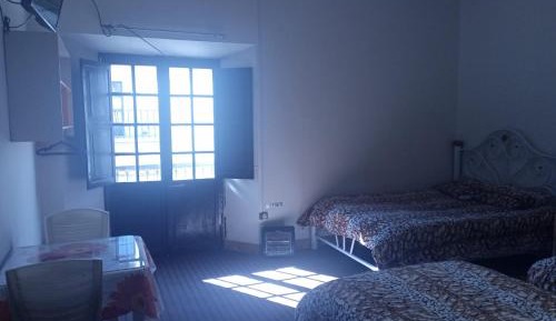 Quadruple Room with Shared Bathroom