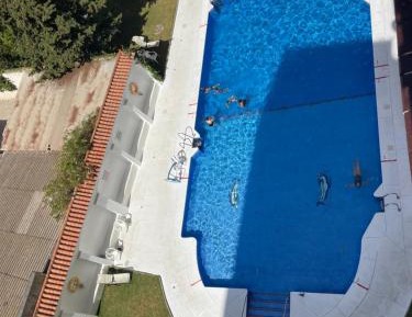 Four-Bedroom Apartment with Pool View