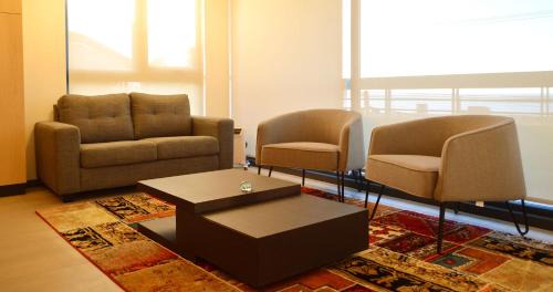 Four-Bedroom Apartment with Balcony 