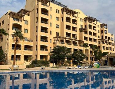 Two-Bedroom Apartment with Balcony and Sea View