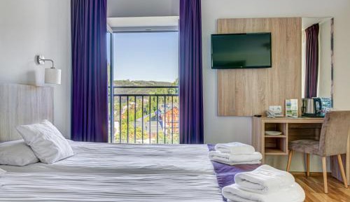 Triple Lux Room with a French Balcony