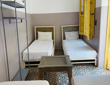 Economy Quadruple Room with Shared Bathroom