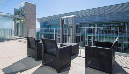 One-Bedroom Apartment with Balcony and City View