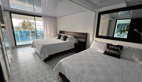One-Bedroom Apartment with Balcony and City View