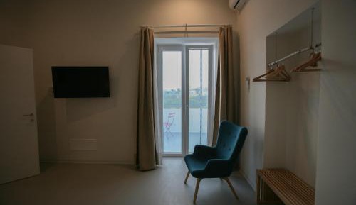 One-Bedroom Apartment with Balcony and Sea View