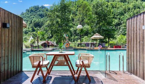 Infinity Pool Deluxe King Room with Balcony and Pool Ladder for Direct Pool Access from Balcony