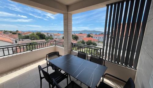 Three-Bedroom Apartment with Sea View