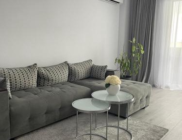 One-Bedroom Apartment with Balcony and City View