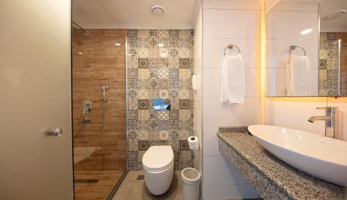 Double or Twin Room with Sea View (2 adults + 2 children)