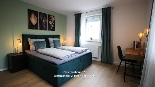 Ferienwohnung Nr. 2 mit 2 Schlafzimmer, Wohnzimmer, gemeinsame Terrasse und Garage