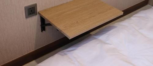 Single Bed in Female Dormitory Room