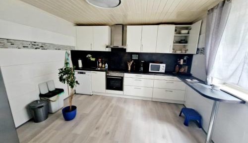 Three-Bedroom Suite with Balcony - Basement