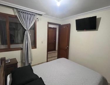 Quadruple Room with Private Bathroom