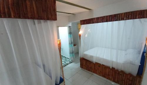 Quadruple Room with Private Bathroom