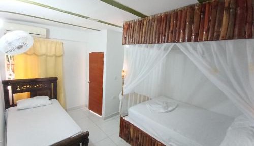 Quadruple Room with Private Bathroom