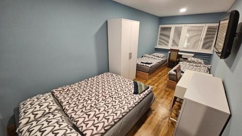 Quadruple Room with Shared Bathroom