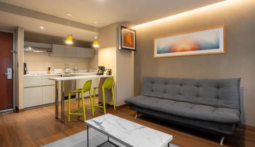 Junior Double Suite with Two Double Beds and Sofa Bed